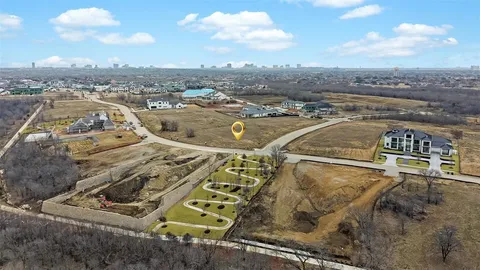 an aerial view of a residential apartment building with a city view