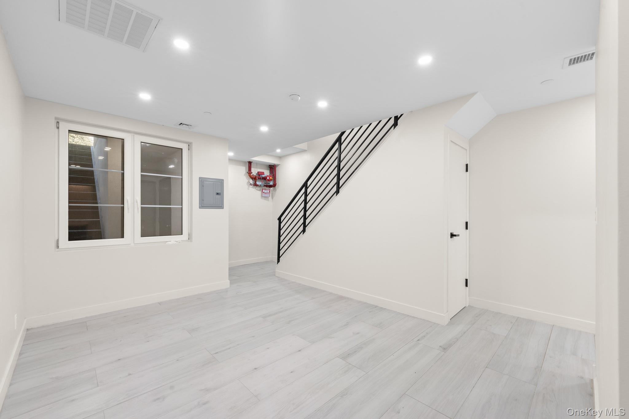 310 Fenimore Street, Unit 1 Brooklyn, NY 11225 - Photo 6 of 15 a view of an entryway with wooden floor