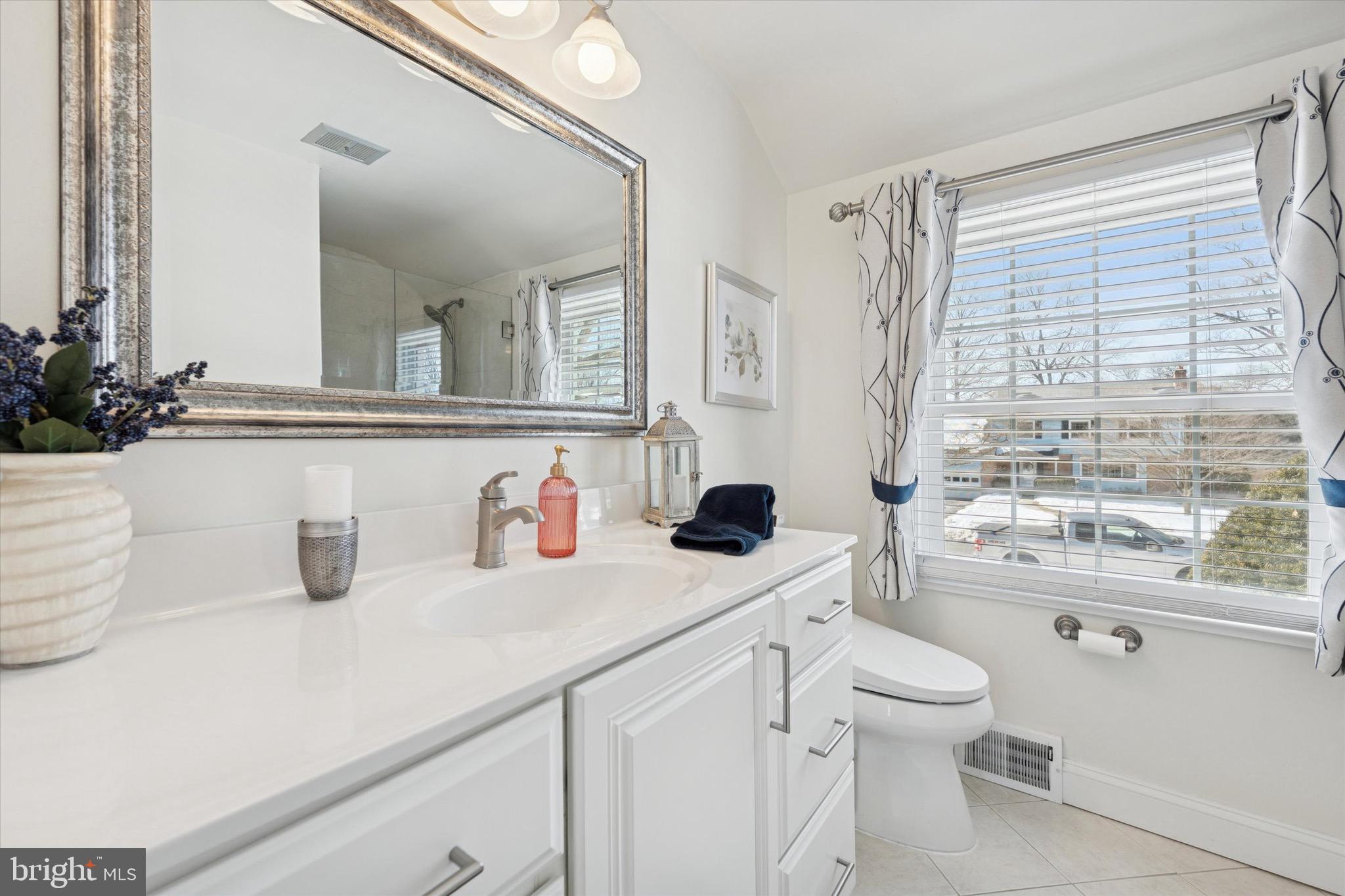 147 Snyder Lane Springfield, PA 19064 - Photo 15 of 42 Primary bath. Tile walk-in shower.