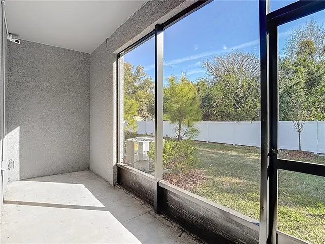 a view of a room and window