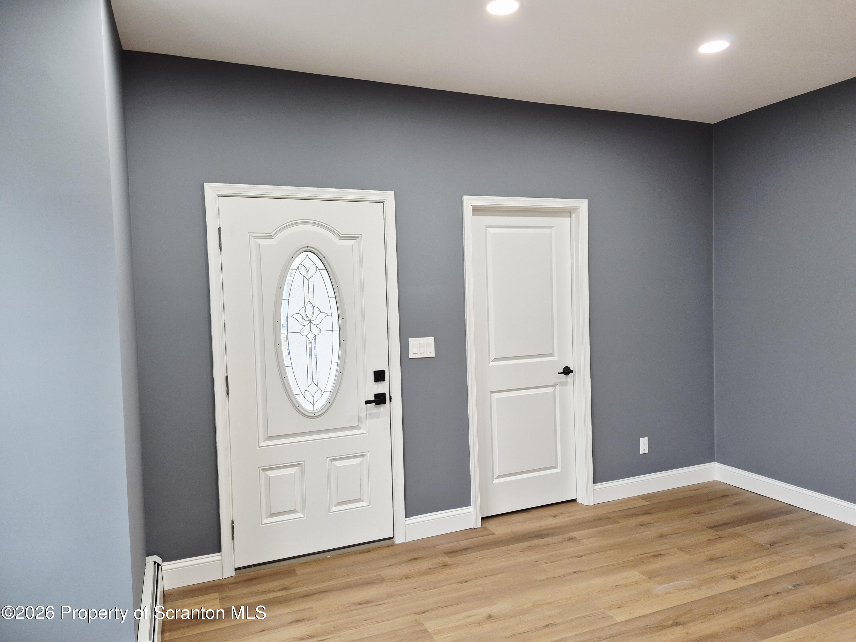 1132 Lloyd Street Scranton, PA 18508 - Photo 13 of 37 a view of a livingroom with wooden floor