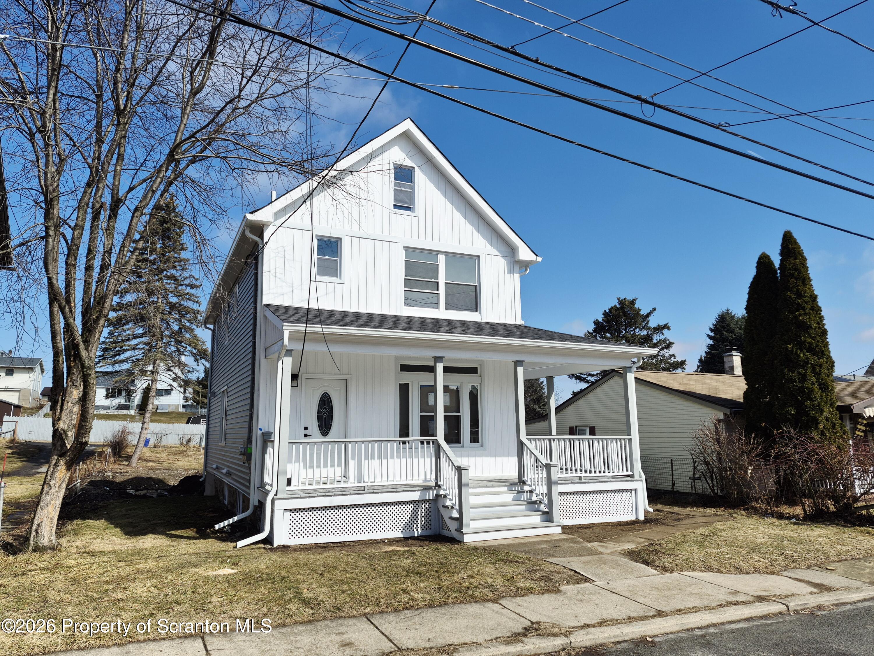 1132 Lloyd Street Scranton, PA 18508 - Photo 3 of 37 a front view of a house with a yard