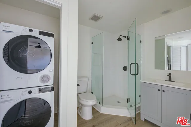 a bathroom with a toilet and a sink