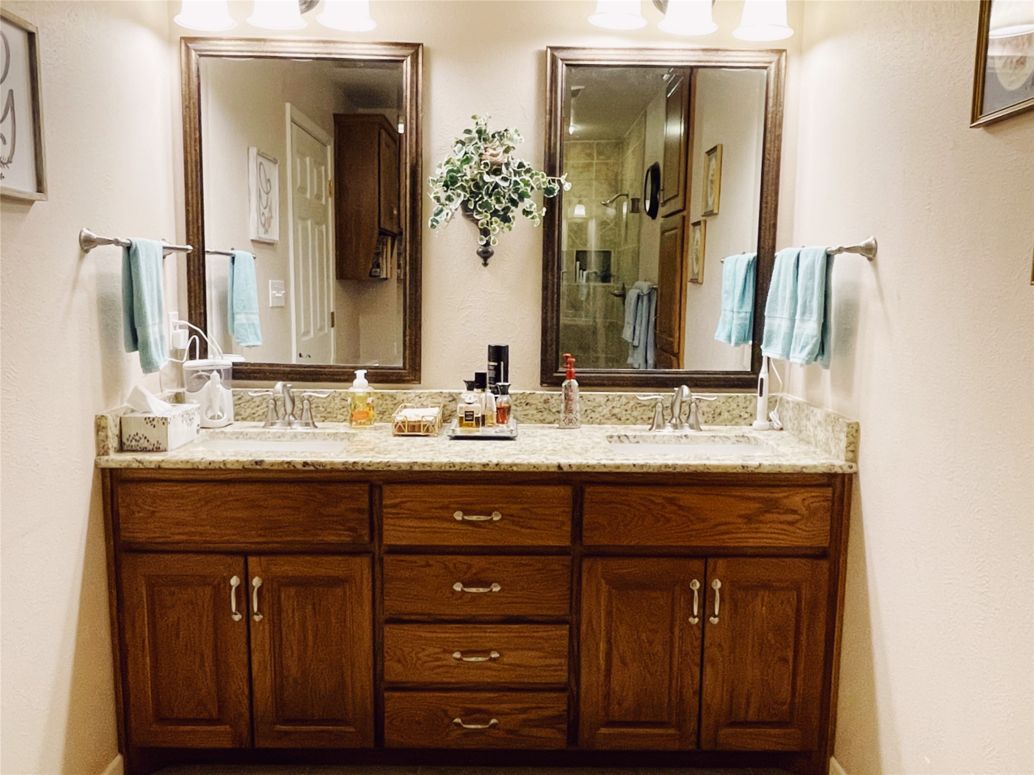 700 Shanklin Road Belton, TX 76513 - Photo 22 of 33 a bathroom with a granite countertop sink vanity and mirror