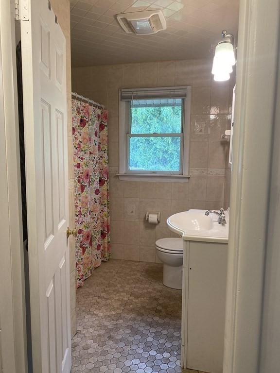29 Hazen Road Shirley, MA 01464 - Photo 23 of 31 a bathroom with a sink toilet and shower