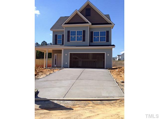 a view of a house with wooden floor and fence