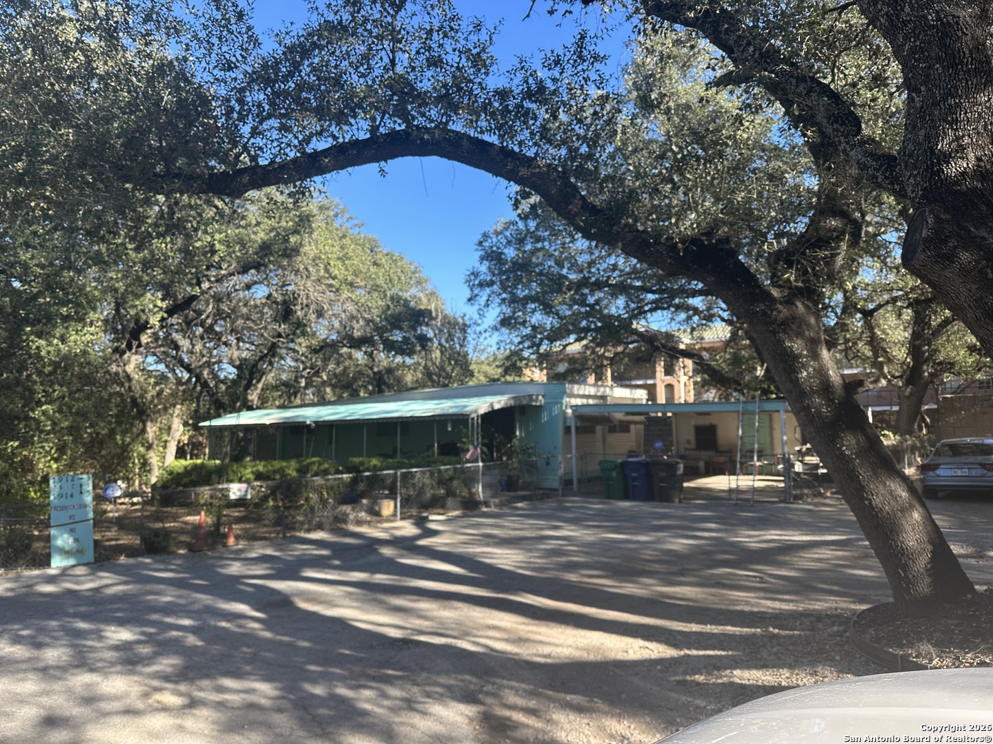 a view of fountain in the backyard of house