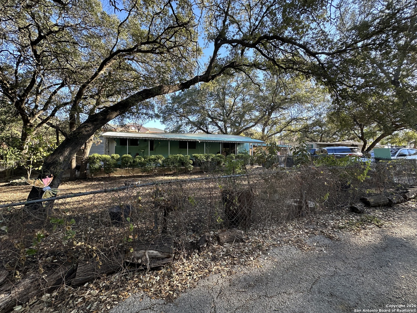 7912 Fredericksburg Road, Unit 3 San Antonio, TX 78229 - Photo 5 of 6 a view of house with a tree in front of it