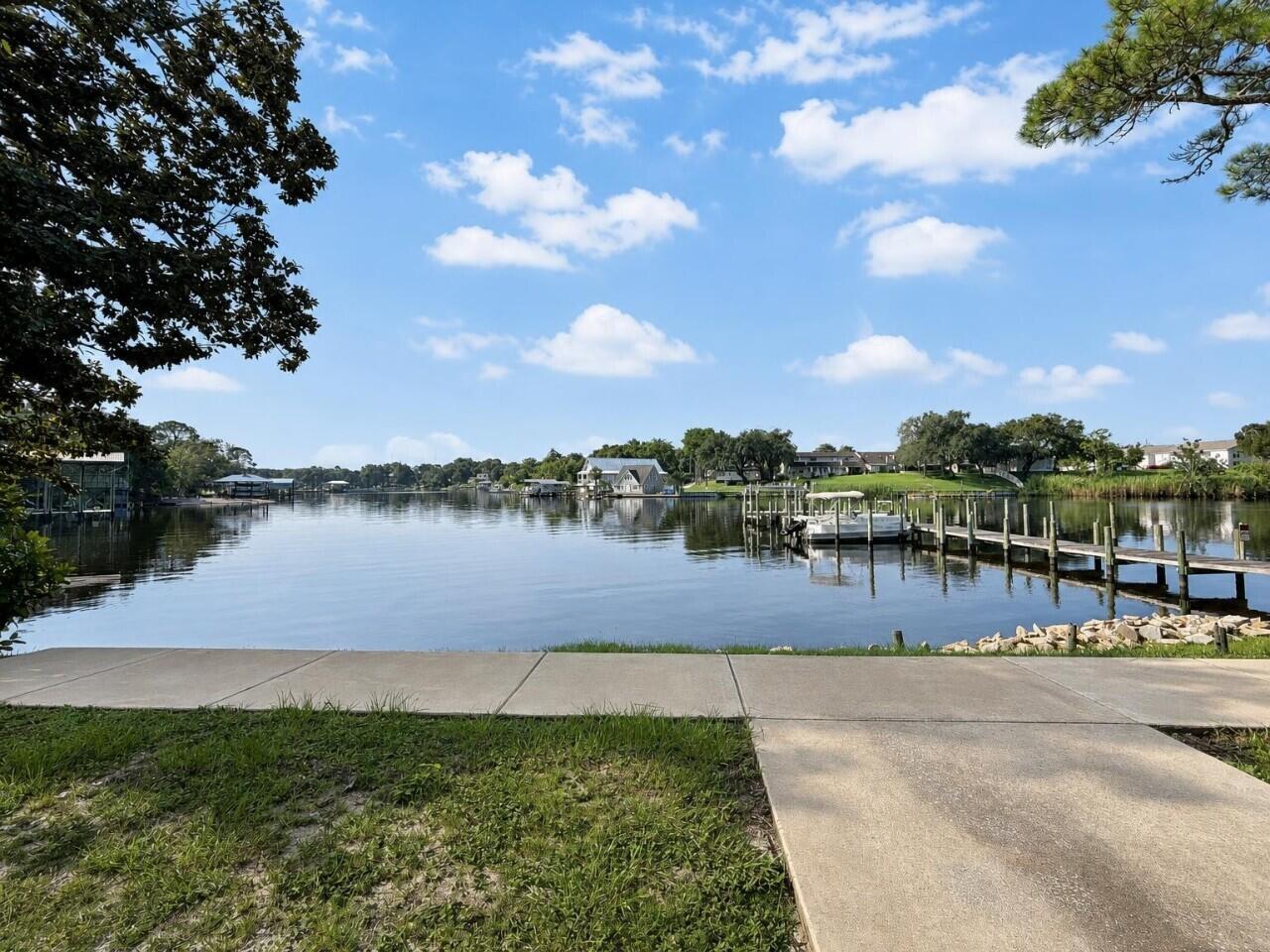 210 Pelham Road, Unit 8B Fort Walton Beach, FL 32547 - Photo 15 of 17 13-exterior_backyard_3
