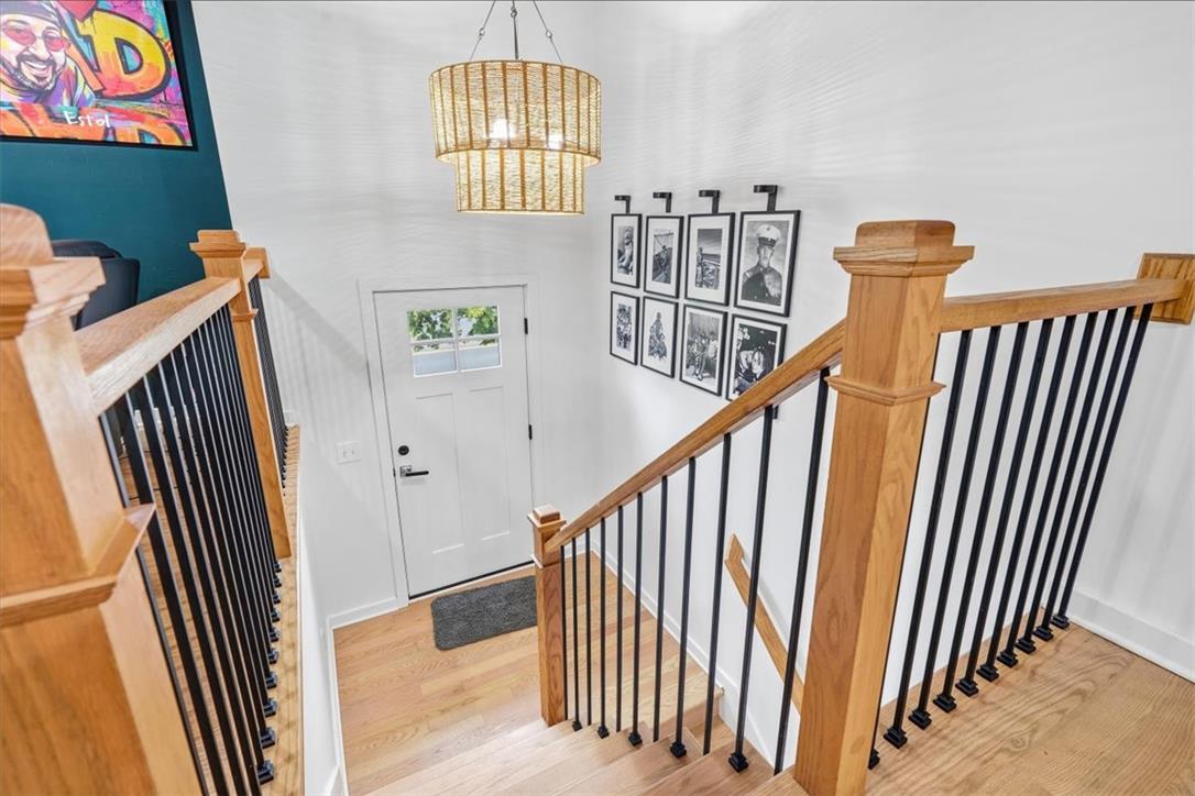 2930 Oakland Road Bethlehem, PA 18017 - Photo 14 of 55 An inviting foyer showcases warm hardwood flooring and stairs framed by handsome wooden railings.