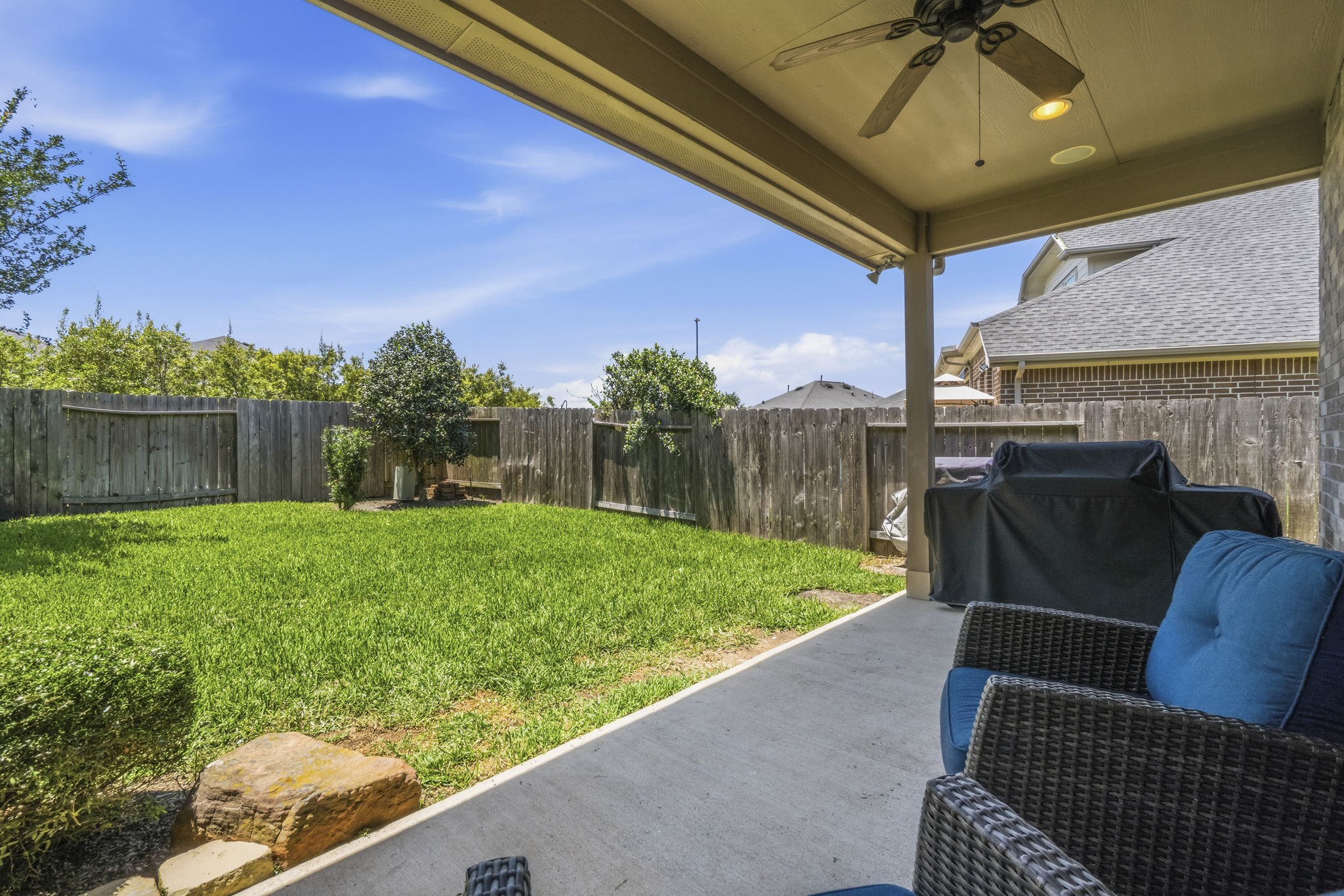 3900 Enchanted Timbers Lane Spring, TX 77386 - Photo 7 of 49 a view of a porch with furniture and a yard