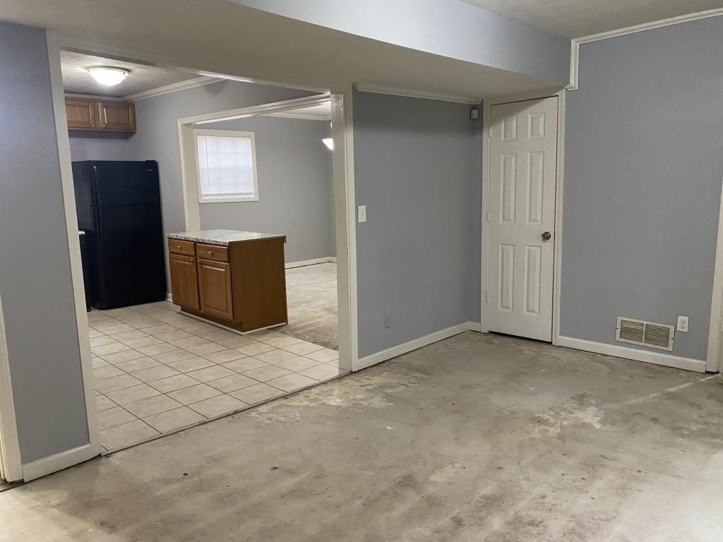 2340 Big Pine Court Conley, GA 30288 - Photo 22 of 25 an empty room with closet and mirror