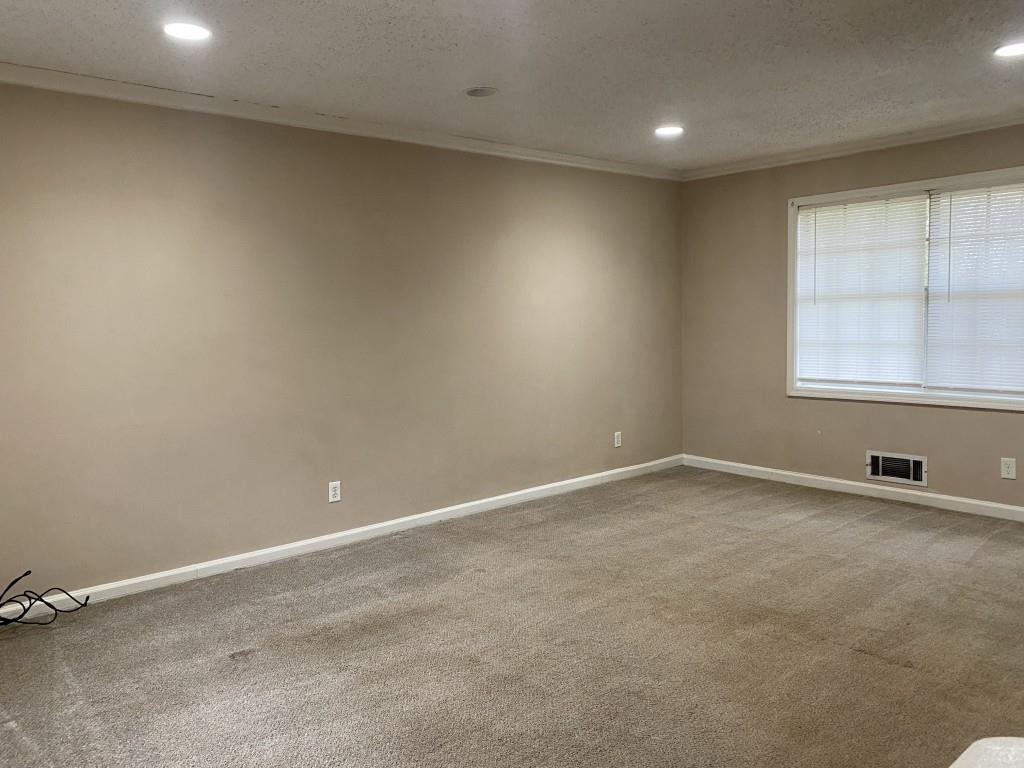 2340 Big Pine Court Conley, GA 30288 - Photo 5 of 25 an empty room with a window