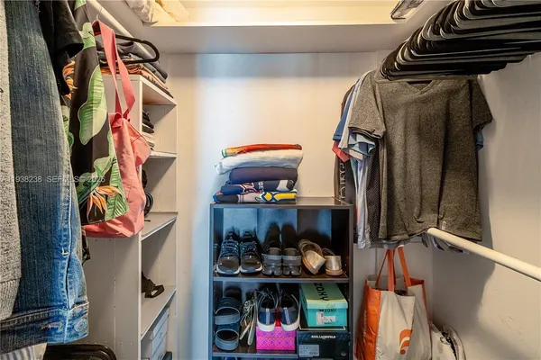 a view of swimming pool with outdoor seating