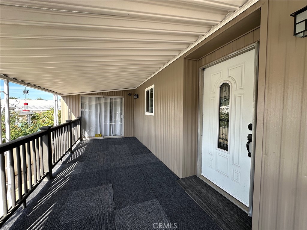 15181 Van Buren Boulevard, Unit 57 Riverside, CA 92504 - Photo 5 of 40 a view of a porch