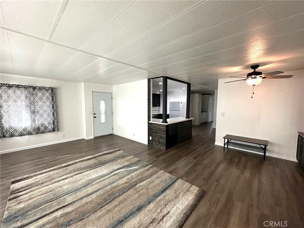 15181 Van Buren Boulevard, Unit 57 Riverside, CA 92504 - Photo 6 of 40 a view of a living room