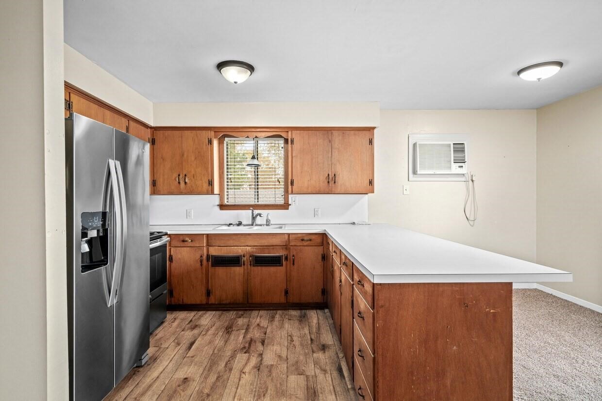 401 East Main Street, Unit 8 Brenham, TX 77833 - Photo 11 of 20 a kitchen with a sink stove and refrigerator