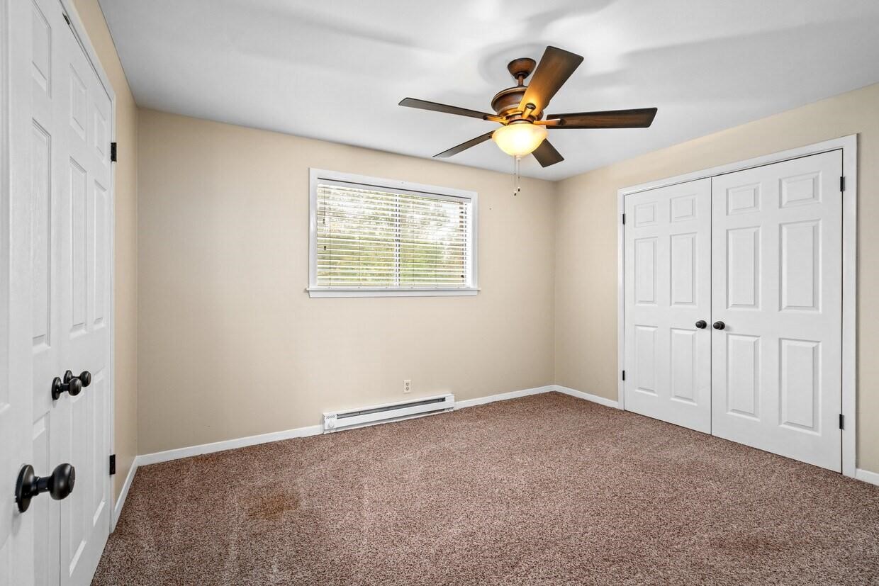 401 East Main Street, Unit 8 Brenham, TX 77833 - Photo 13 of 20 a view of an empty room with a window