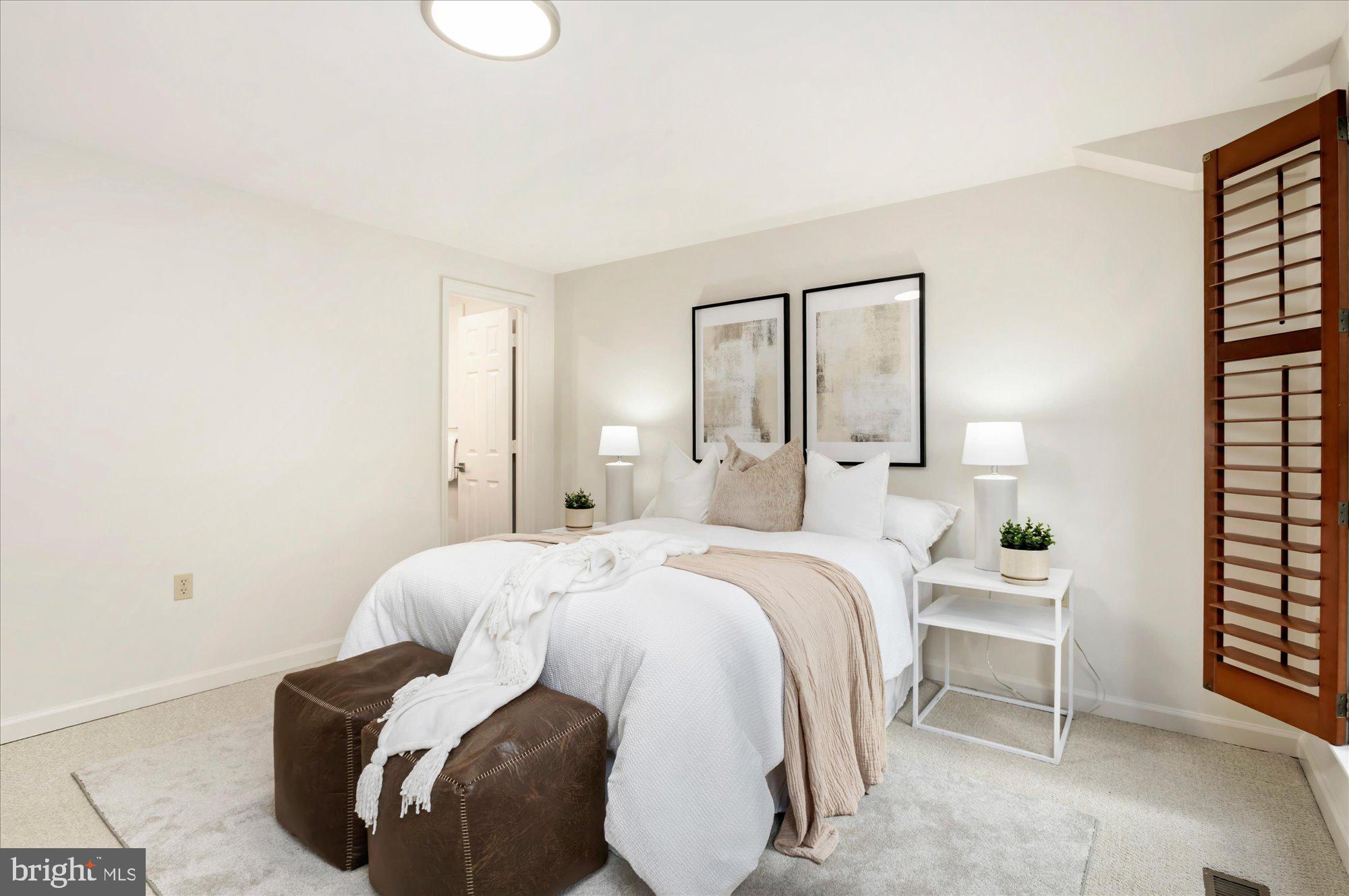 1913 Kalorama Place Northwest, Unit 13 Washington, DC 20009 - Photo 22 of 33 a bedroom with a bed and a window