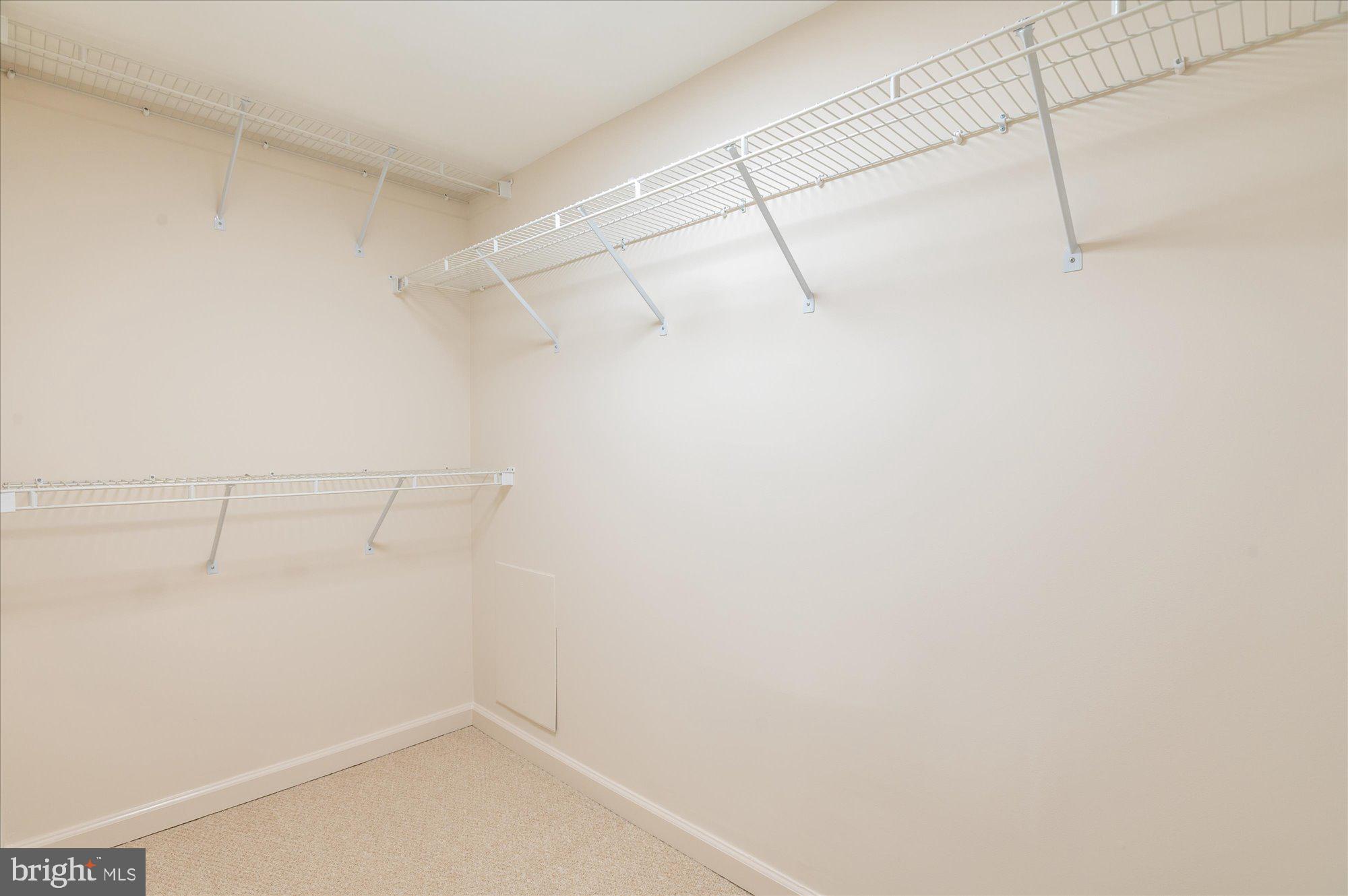 1913 Kalorama Place Northwest, Unit 13 Washington, DC 20009 - Photo 26 of 33 a view of a room with racks on the wall