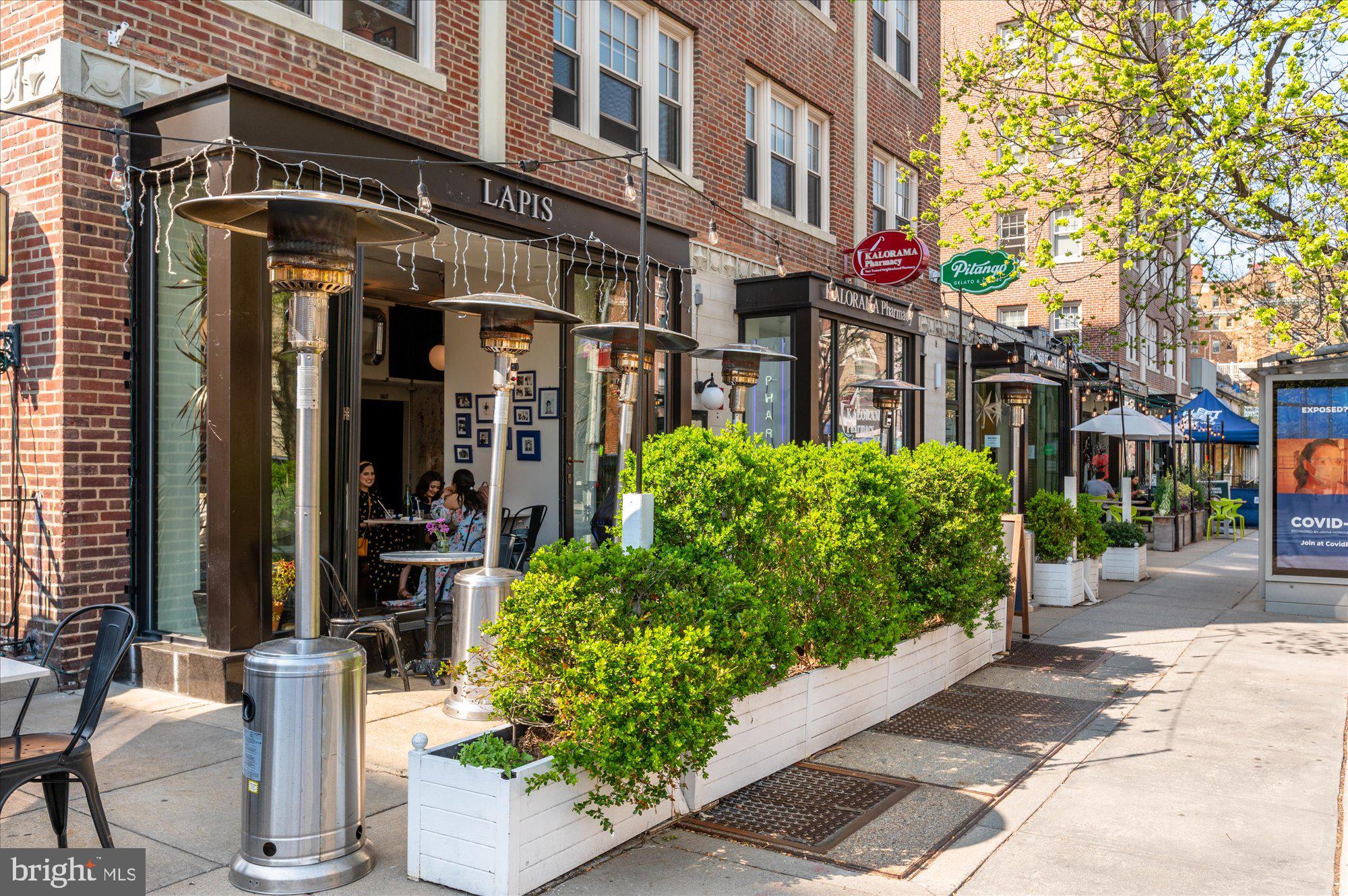1913 Kalorama Place Northwest, Unit 13 Washington, DC 20009 - Photo 31 of 33 a view of a building with potted plants