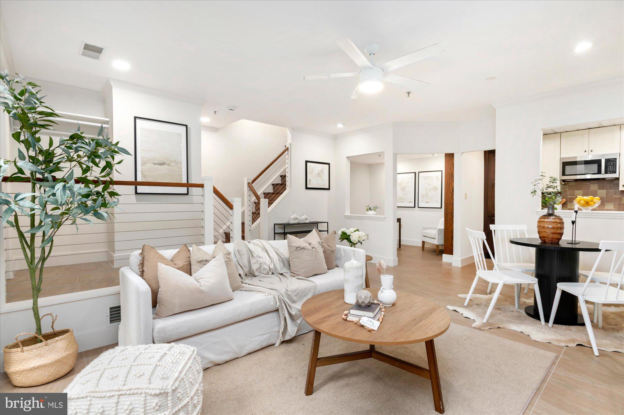 1913 Kalorama Place Northwest, Unit 13 Washington, DC 20009 - Photo 8 of 33 a living room with furniture and wooden floor
