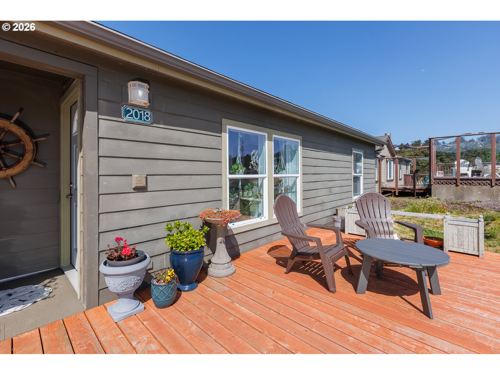 2018 Northwest Oceanic Loop Waldport, OR 97394 - Photo 2 of 35 a view of a patio with couches and potted plants