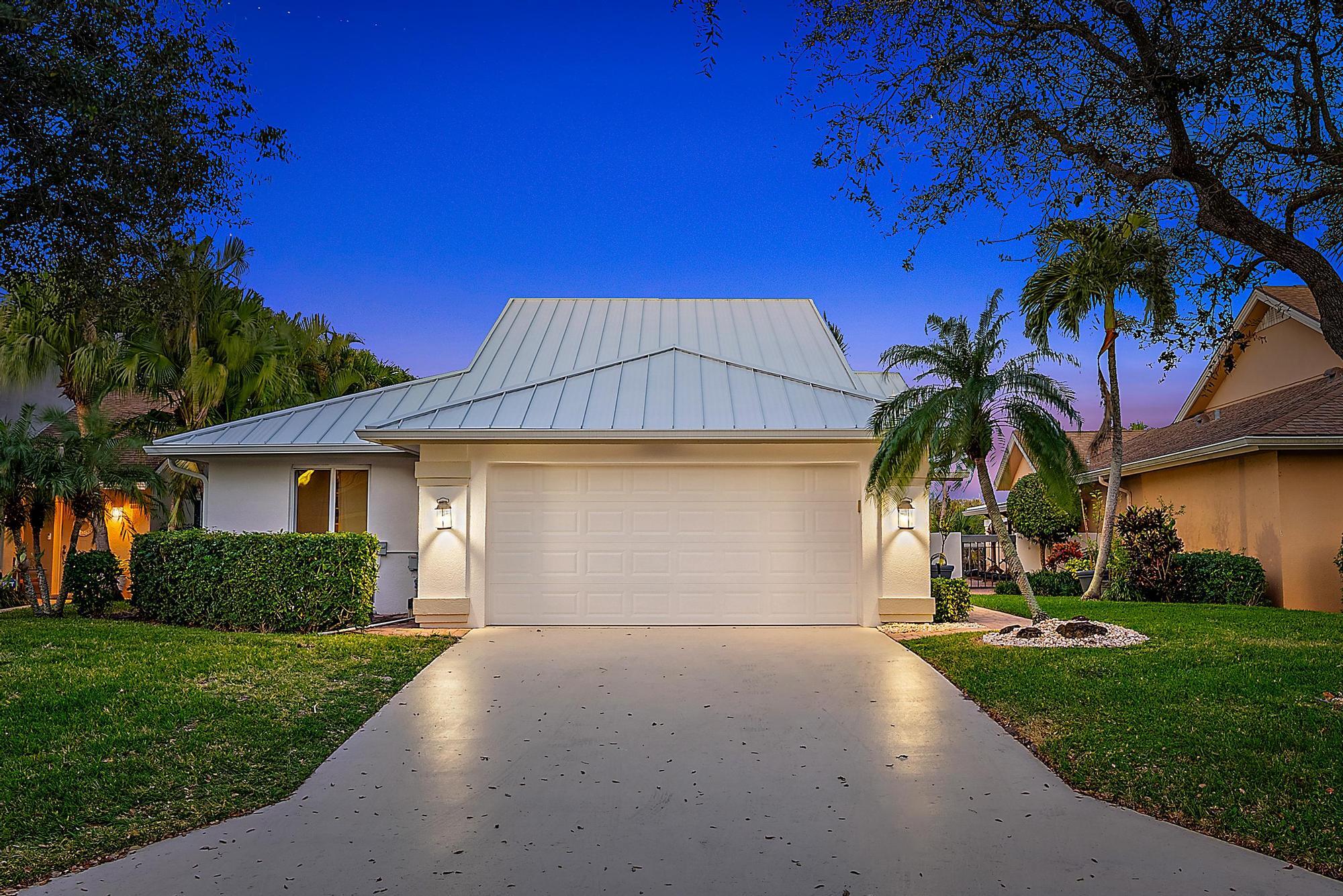 223 Ridge Road Jupiter, FL 33477 - Photo 1 of 46 Exterior Twilight