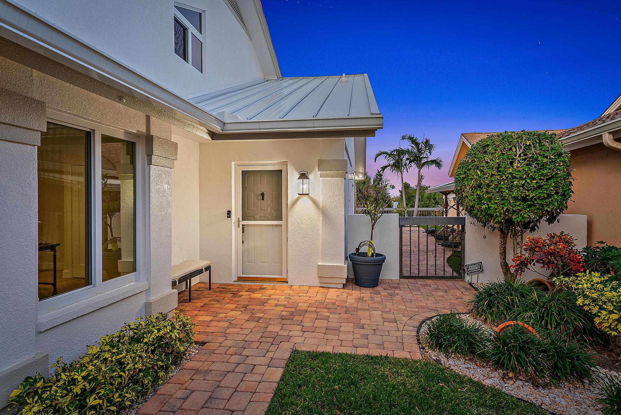 223 Ridge Road Jupiter, FL 33477 - Photo 2 of 46 Exterior Twilight