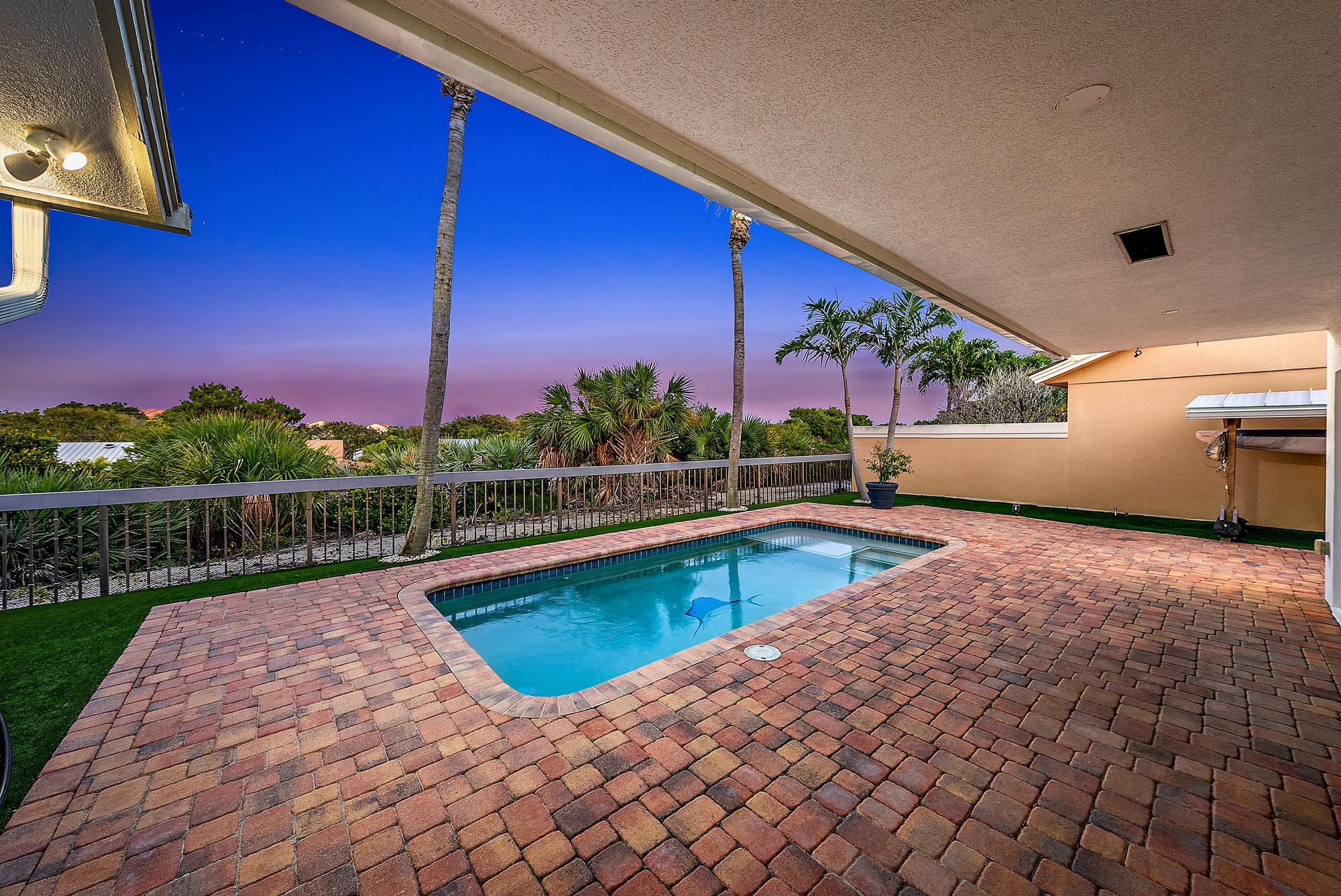 223 Ridge Road Jupiter, FL 33477 - Photo 3 of 46 Exterior Pool at Twilight