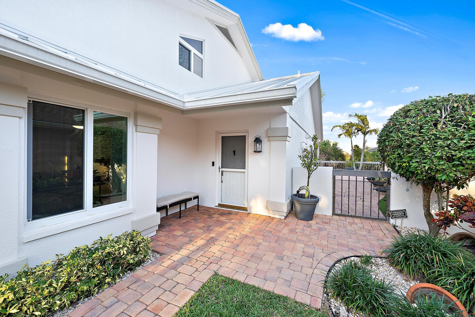 223 Ridge Road Jupiter, FL 33477 - Photo 8 of 46 Front Exterior