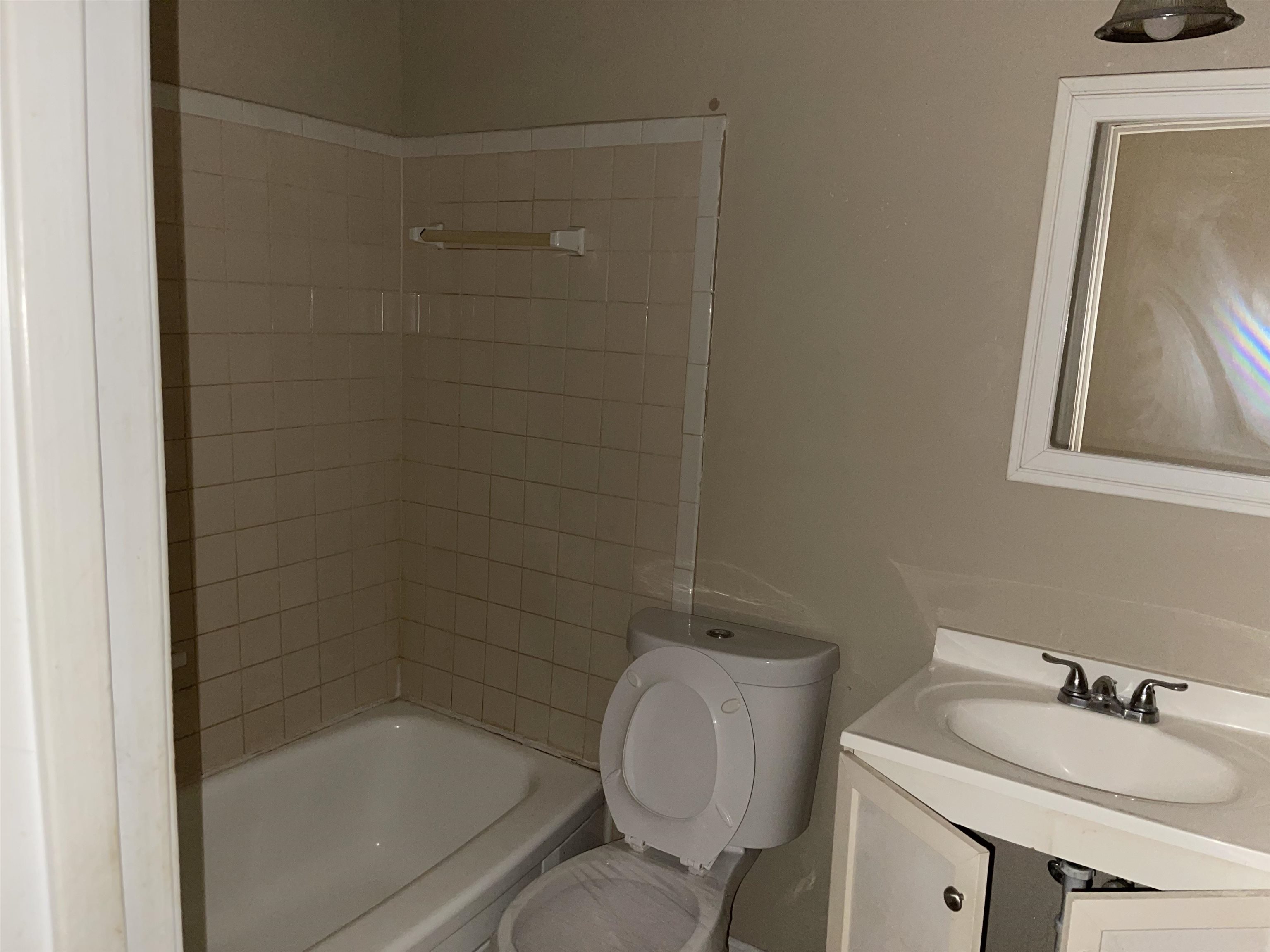 1624 Winfield Road Memphis, TN 38116 - Photo 12 of 14 a bathroom with a sink toilet and shower