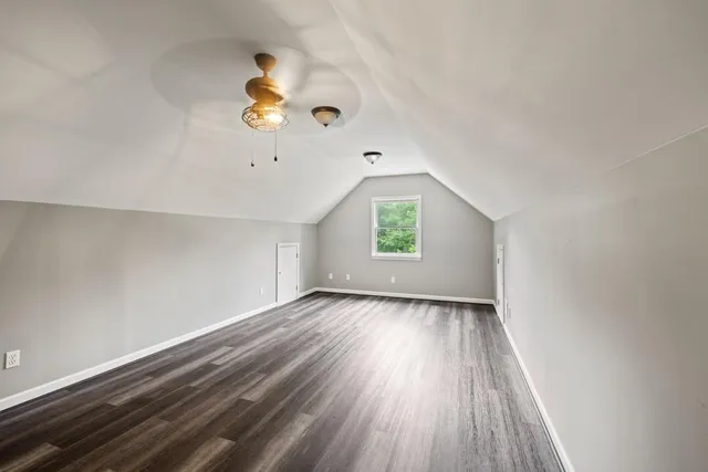 a view of a chairs and table on the deck