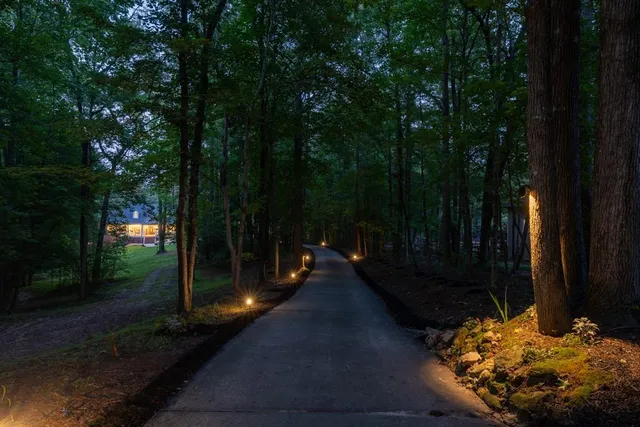 a view of a house with porch and wooden floor