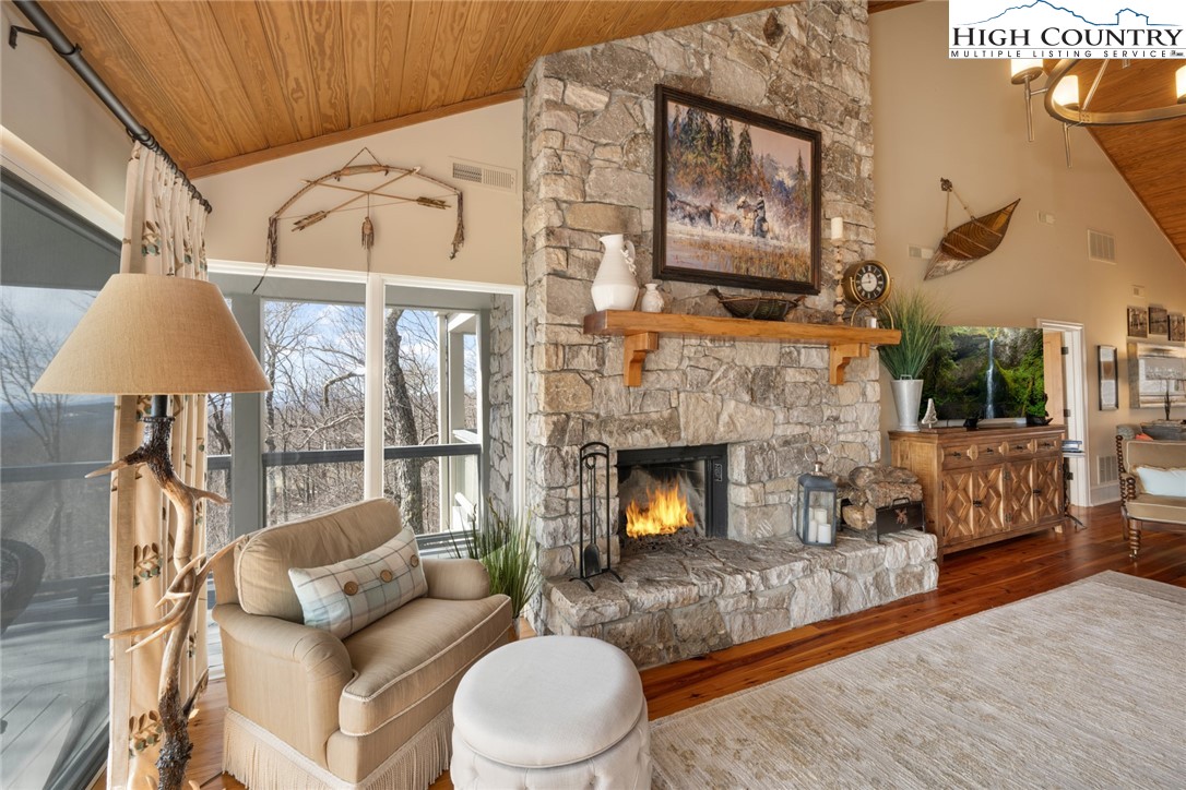 404 Moon Run, Unit D Linville, NC 28646 - Photo 6 of 27 a living room with furniture and a fireplace