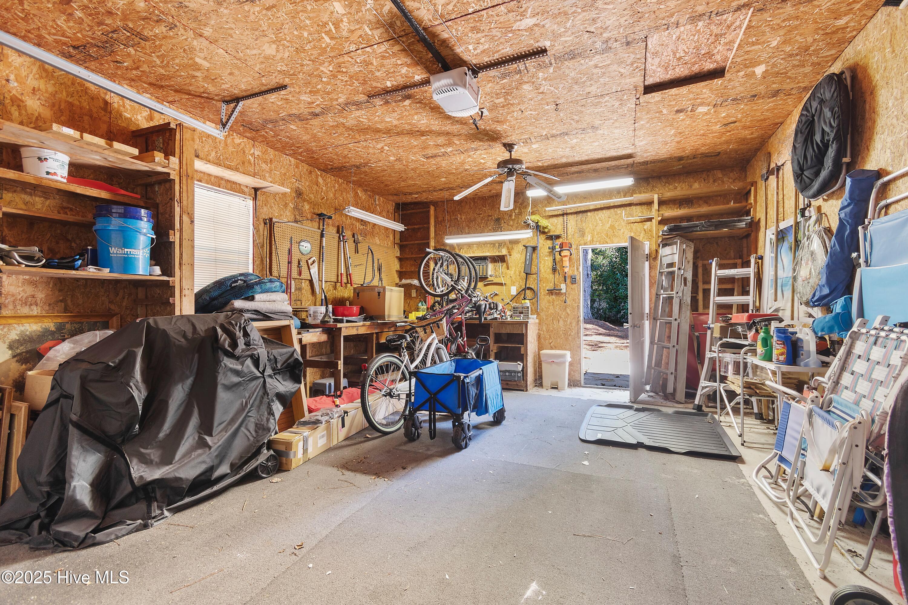 984 Myrtle Court Southwest Calabash, NC 28467 - Photo 22 of 33 Garage with lots of shelves & storage