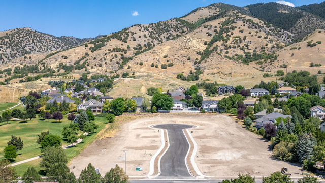 1473 Red Fox Court, Unit 4 Logan, UT 84321 - Photo 17 of 19 Developing cul-de-sac lot featuring new asphalt paving and concrete curbing