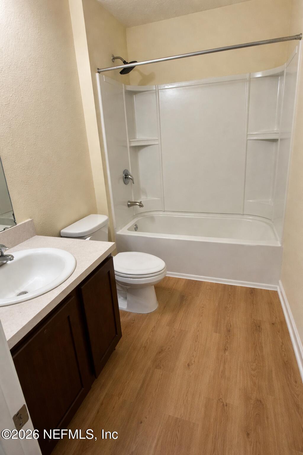 234 Cody Street St. Augustine, FL 32084 - Photo 14 of 20 a bathroom with a sink a toilet and a bathtub