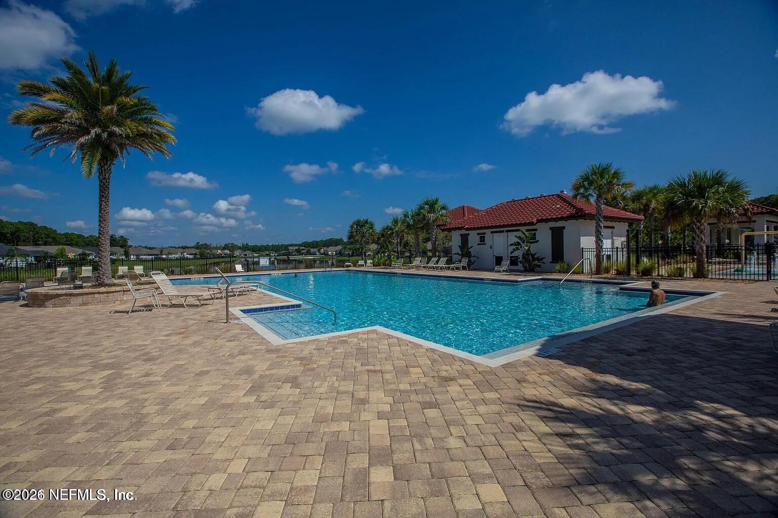 234 Cody Street St. Augustine, FL 32084 - Photo 18 of 20 a view of a lake with a swimming pool