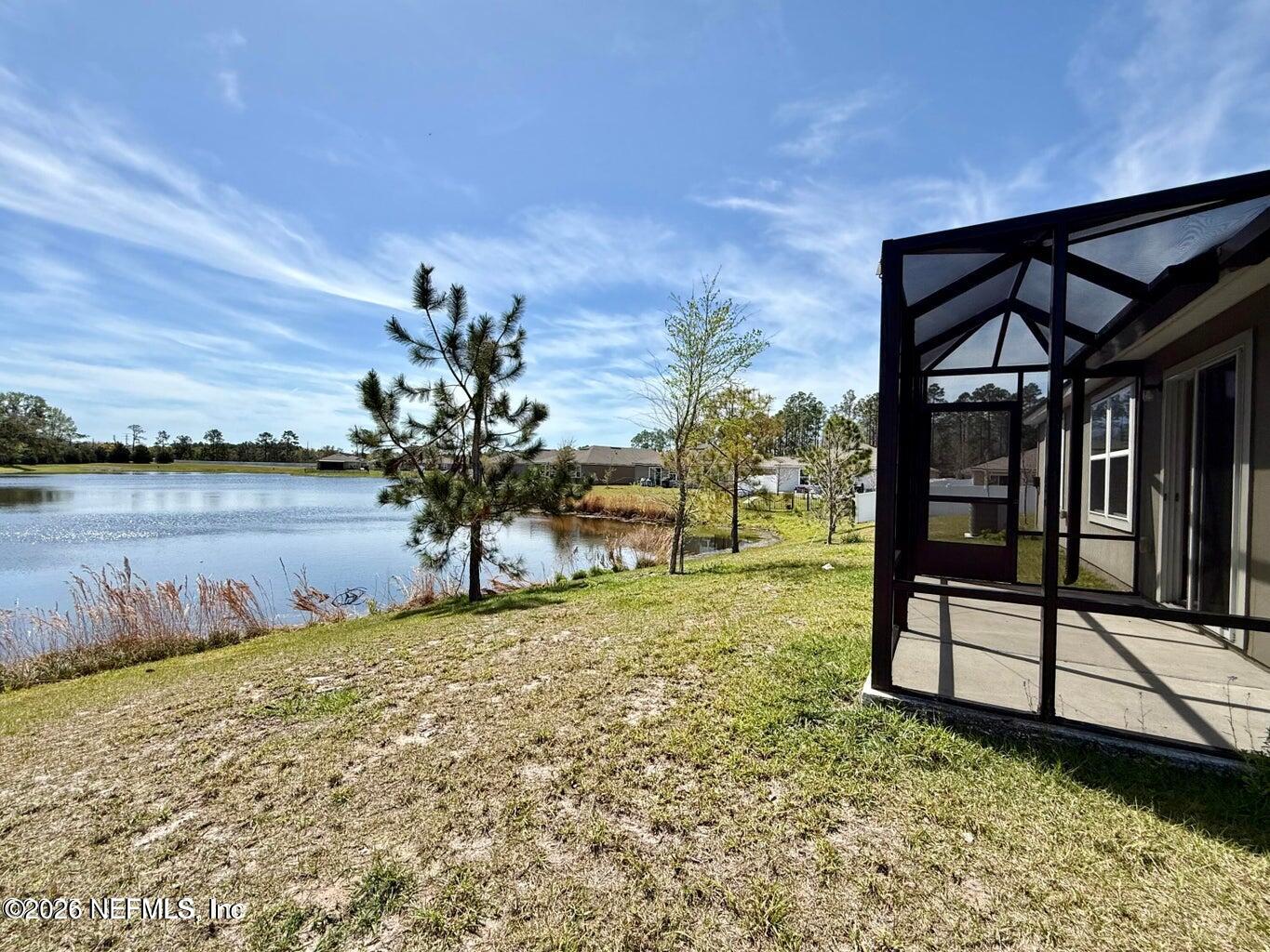 234 Cody Street St. Augustine, FL 32084 - Photo 4 of 20 a view of a lake with a mountain in the background