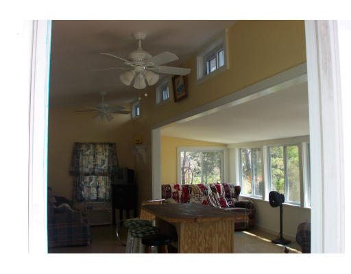 24 F Hideaway Road Bourne, MA 02532 - Photo 4 of 4 a living room with furniture