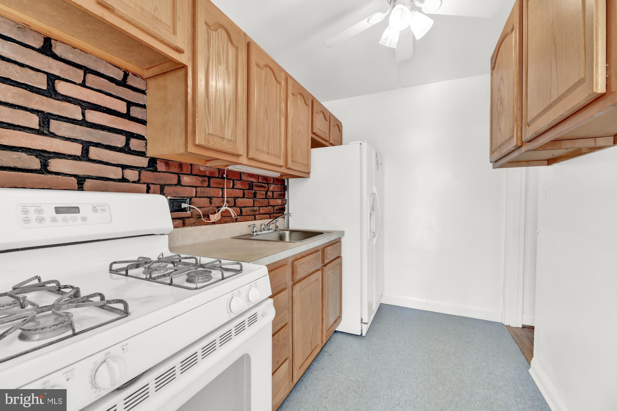 1827 Swansea Road Baltimore, MD 21239 - Photo 9 of 25 Galley Kitchen