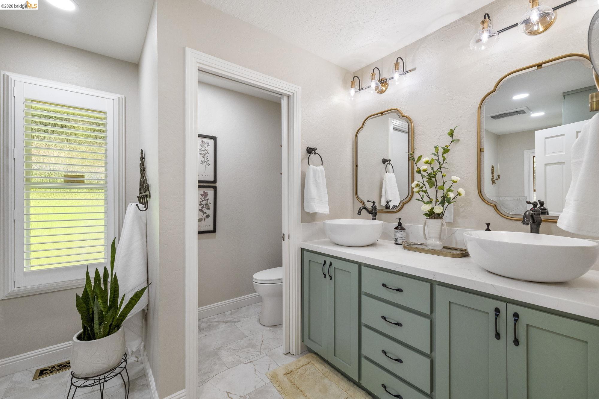 20581 Gerber Road Tuolumne, CA 95379 - Photo 6 of 60 Bathroom featuring double vanity and recessed lighting