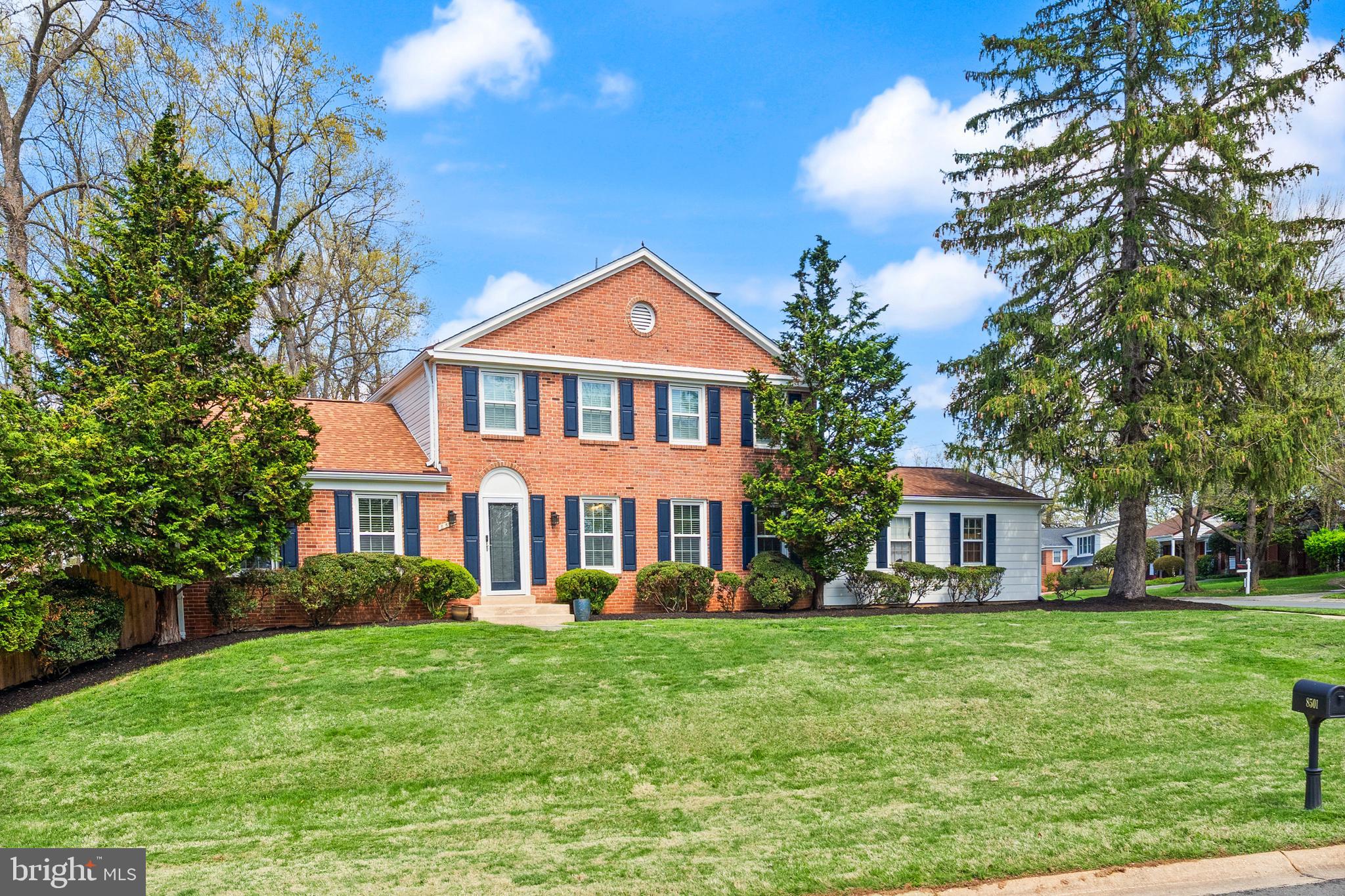 8501 Aqueduct Road Potomac, MD 20854 - Photo 2 of 75 a front view of a house with a yard