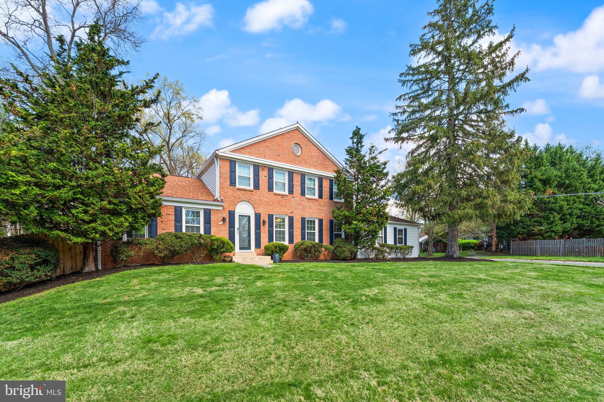 8501 Aqueduct Road Potomac, MD 20854 - Photo 2 of 54 a front view of a house with a yard