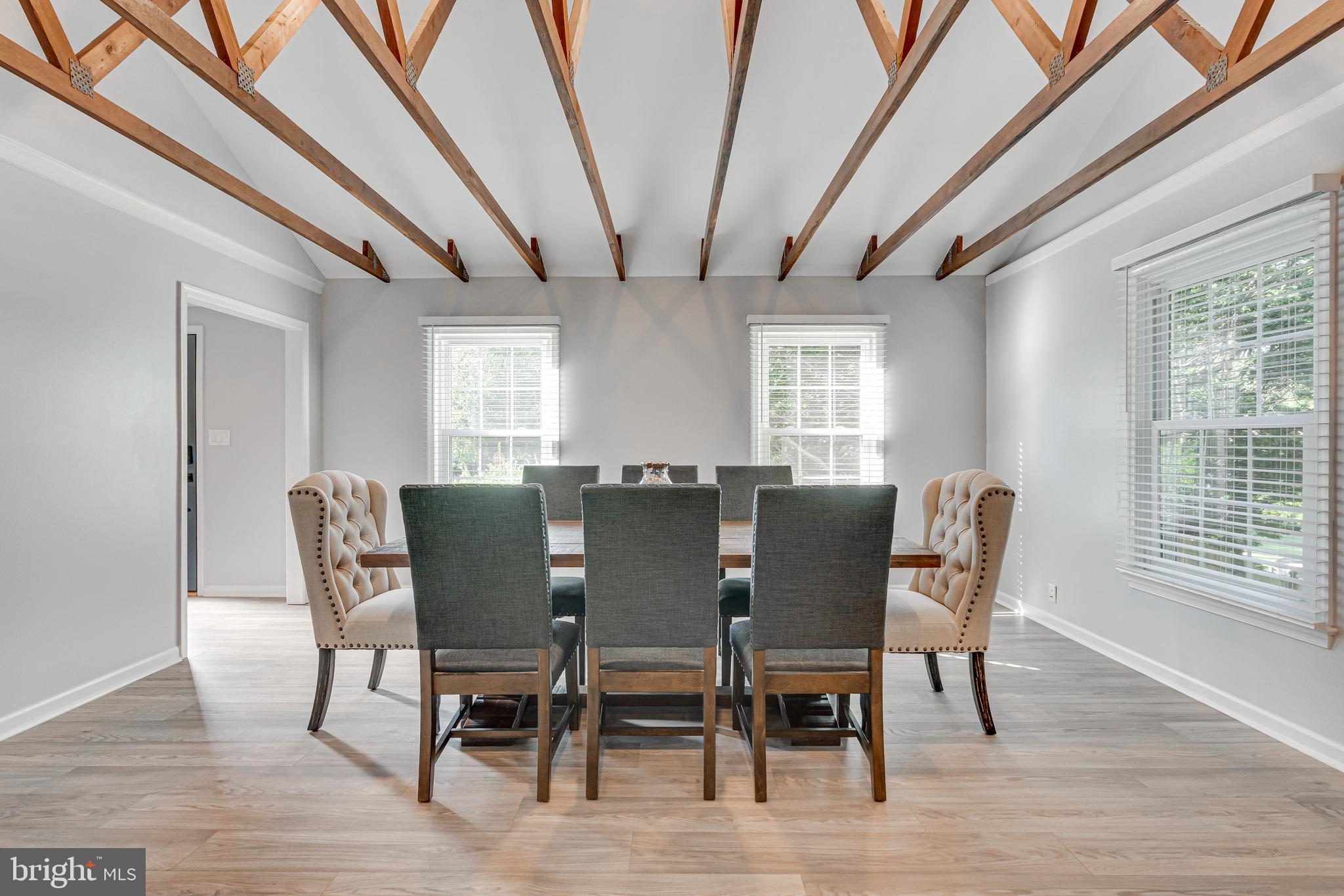 8501 Aqueduct Road Potomac, MD 20854 - Photo 22 of 75 a view of a dining room with furniture window and wooden floor