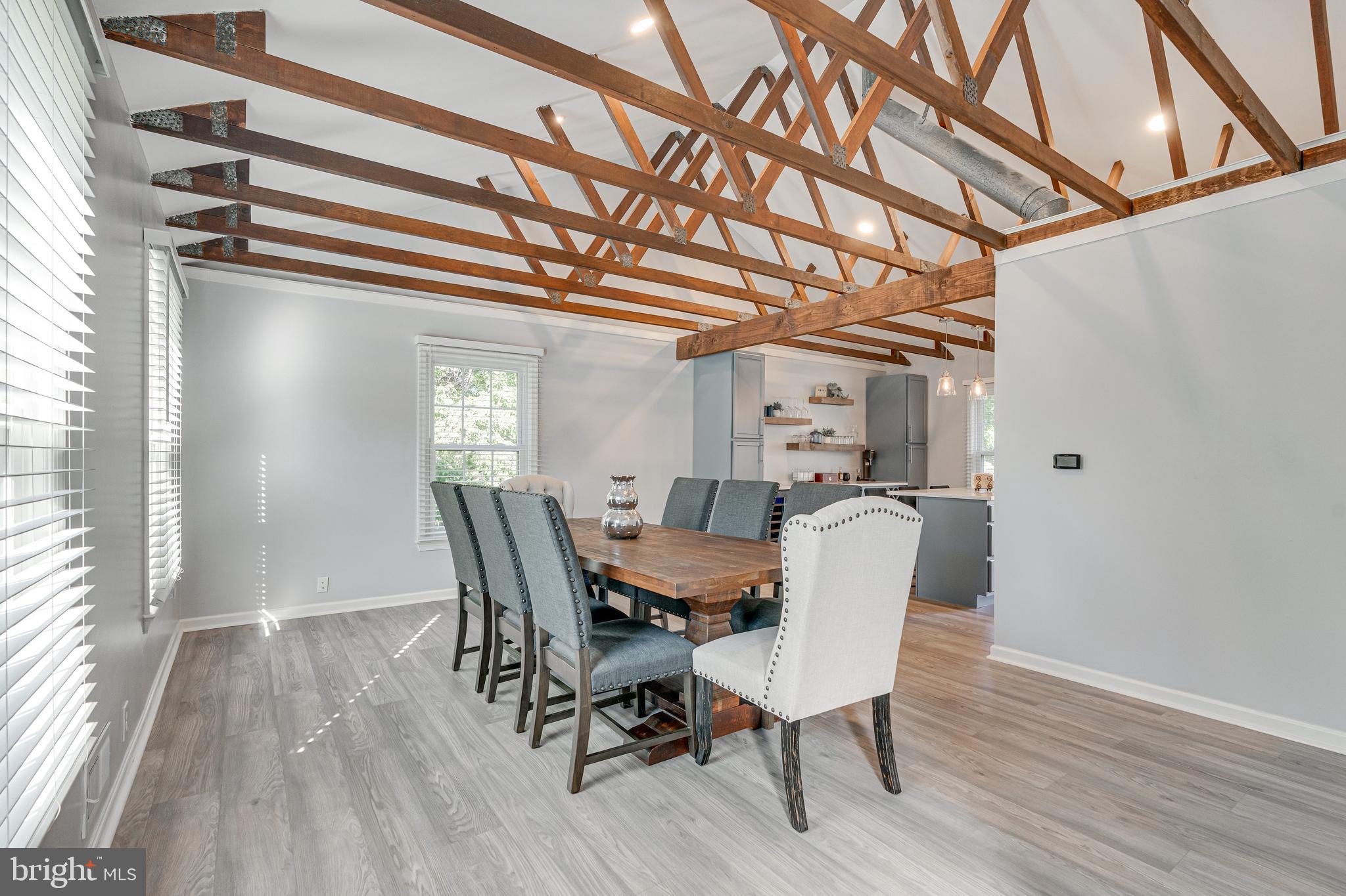 8501 Aqueduct Road Potomac, MD 20854 - Photo 22 of 54 a dining room with furniture and window