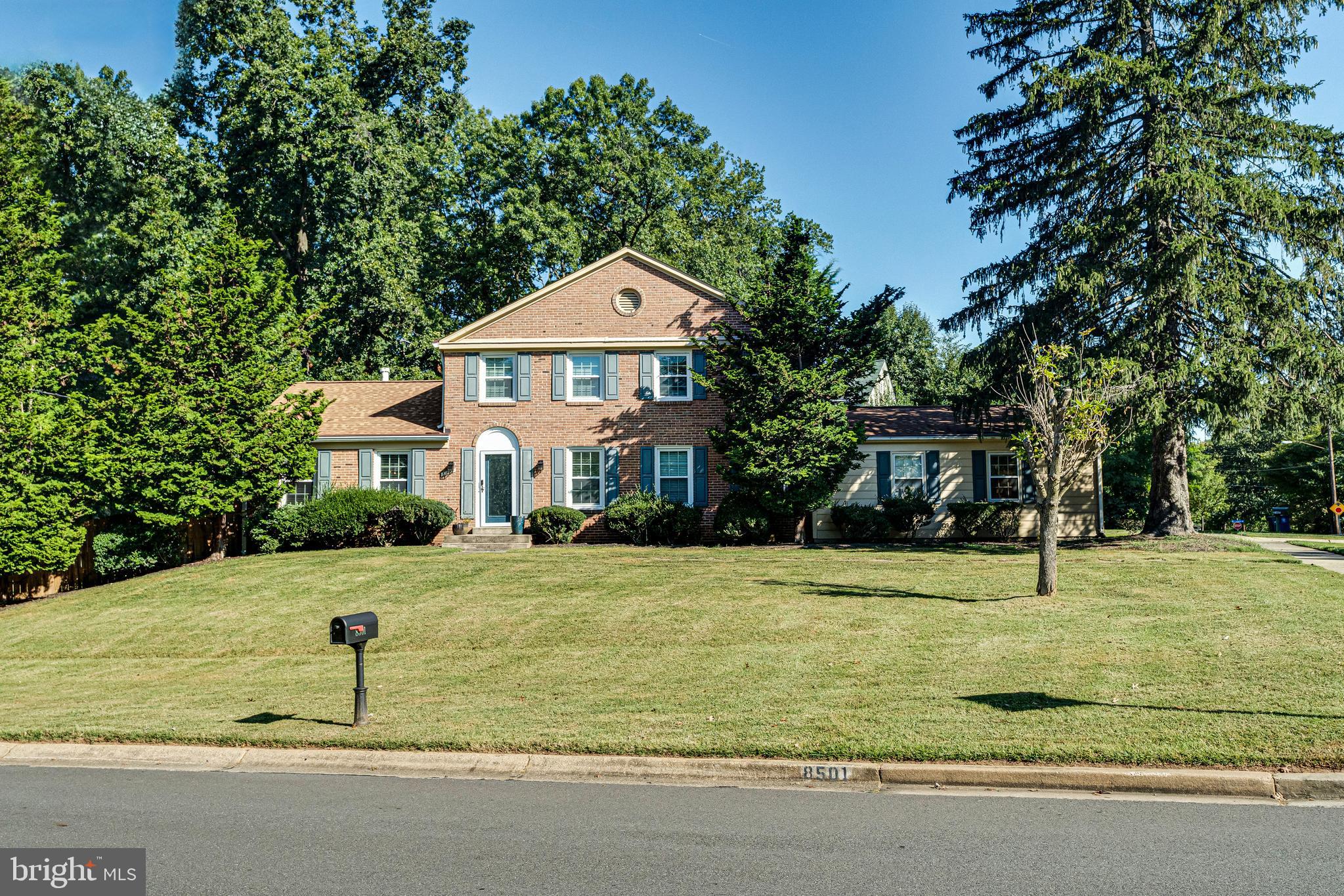8501 Aqueduct Road Potomac, MD 20854 - Photo 3 of 75 a front view of a house with a yard