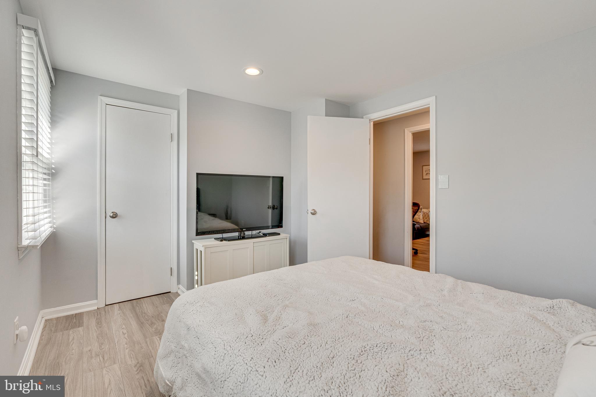 8501 Aqueduct Road Potomac, MD 20854 - Photo 37 of 75 a bedroom with a bed and a flat screen tv