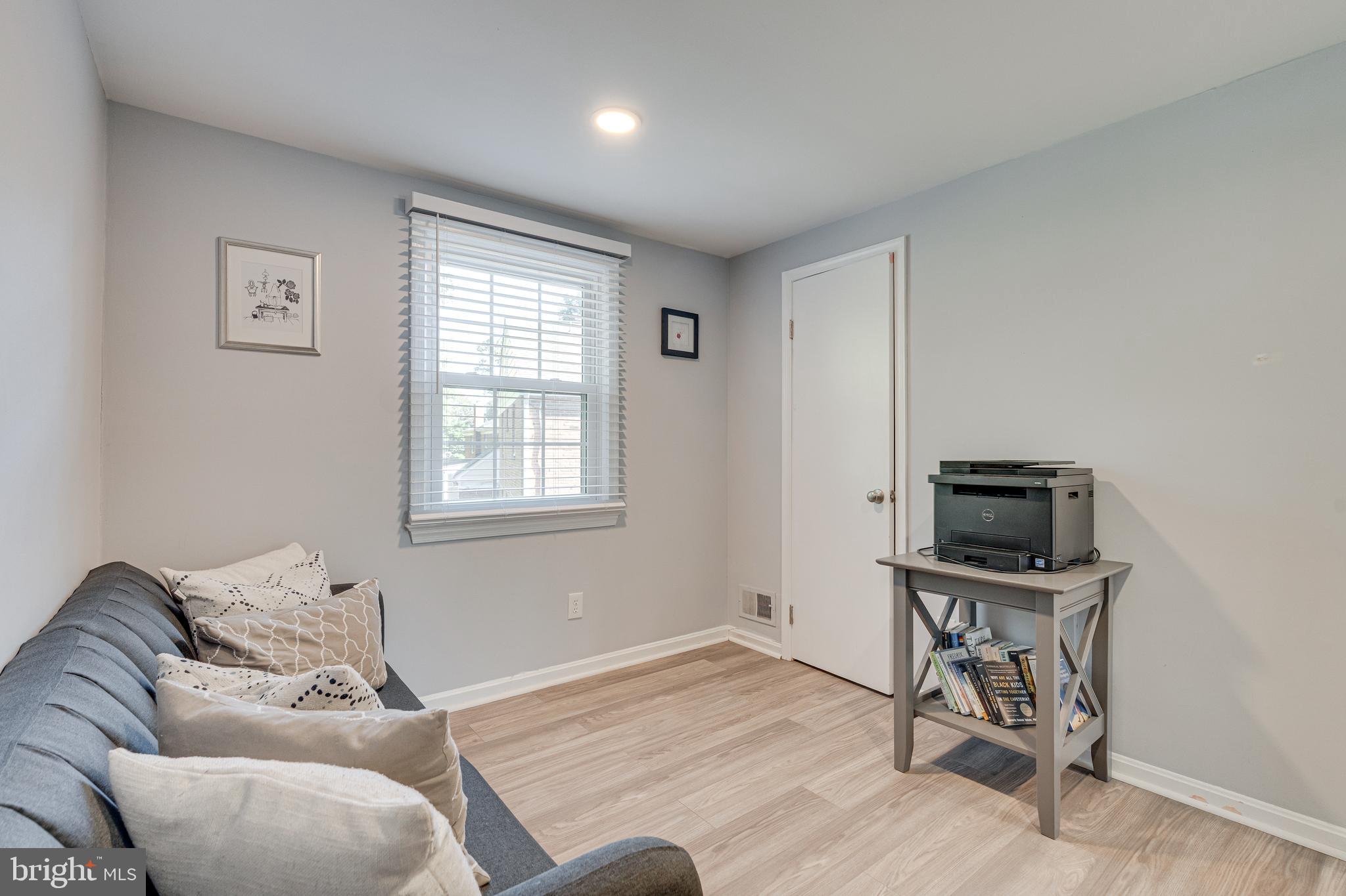 8501 Aqueduct Road Potomac, MD 20854 - Photo 39 of 75 a living room with furniture and a window